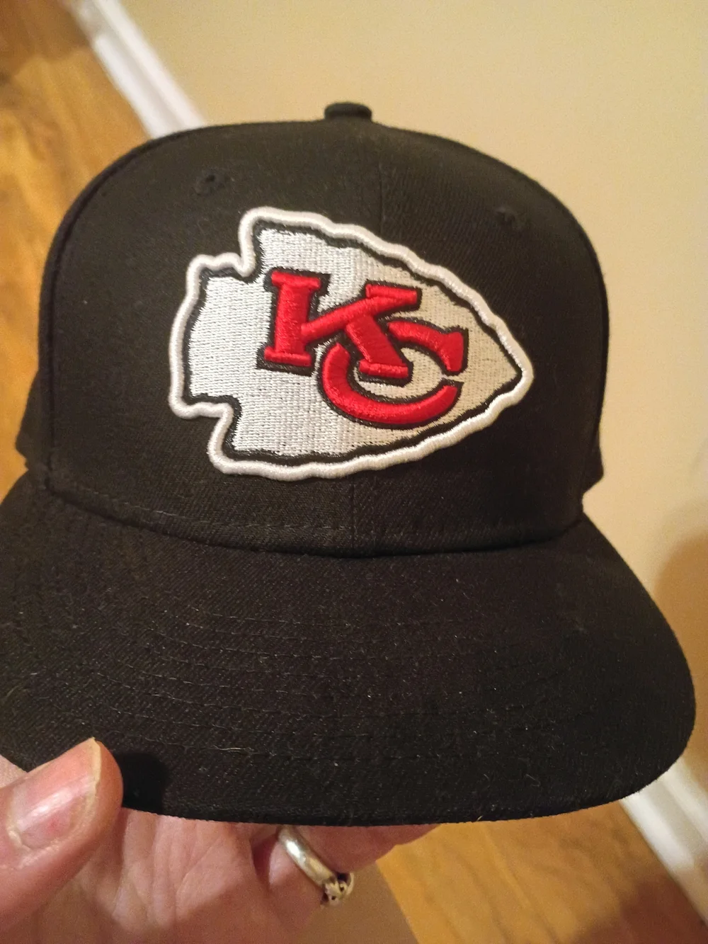 The New Era 59FIFTY Kansas City Chiefs NFL Black Fitted Cap Hat in size 7 1/8